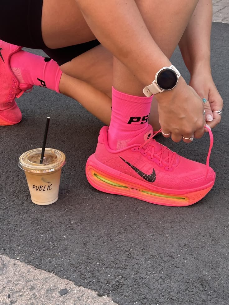 Pink Nike running shoes